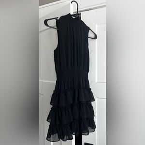 Black ruffle skirt dress with ruched waist and neck